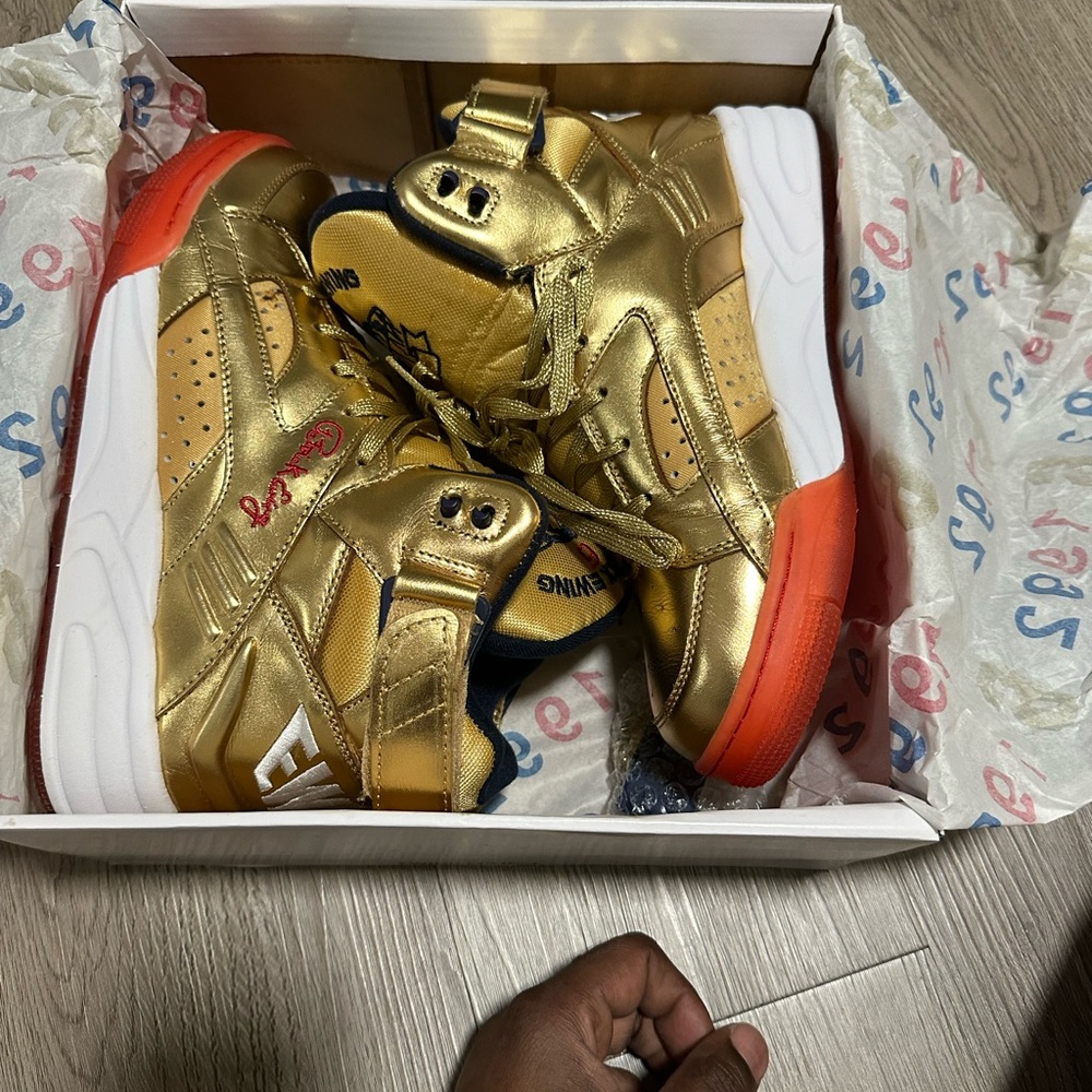 Gold and Red Athletic Shoes